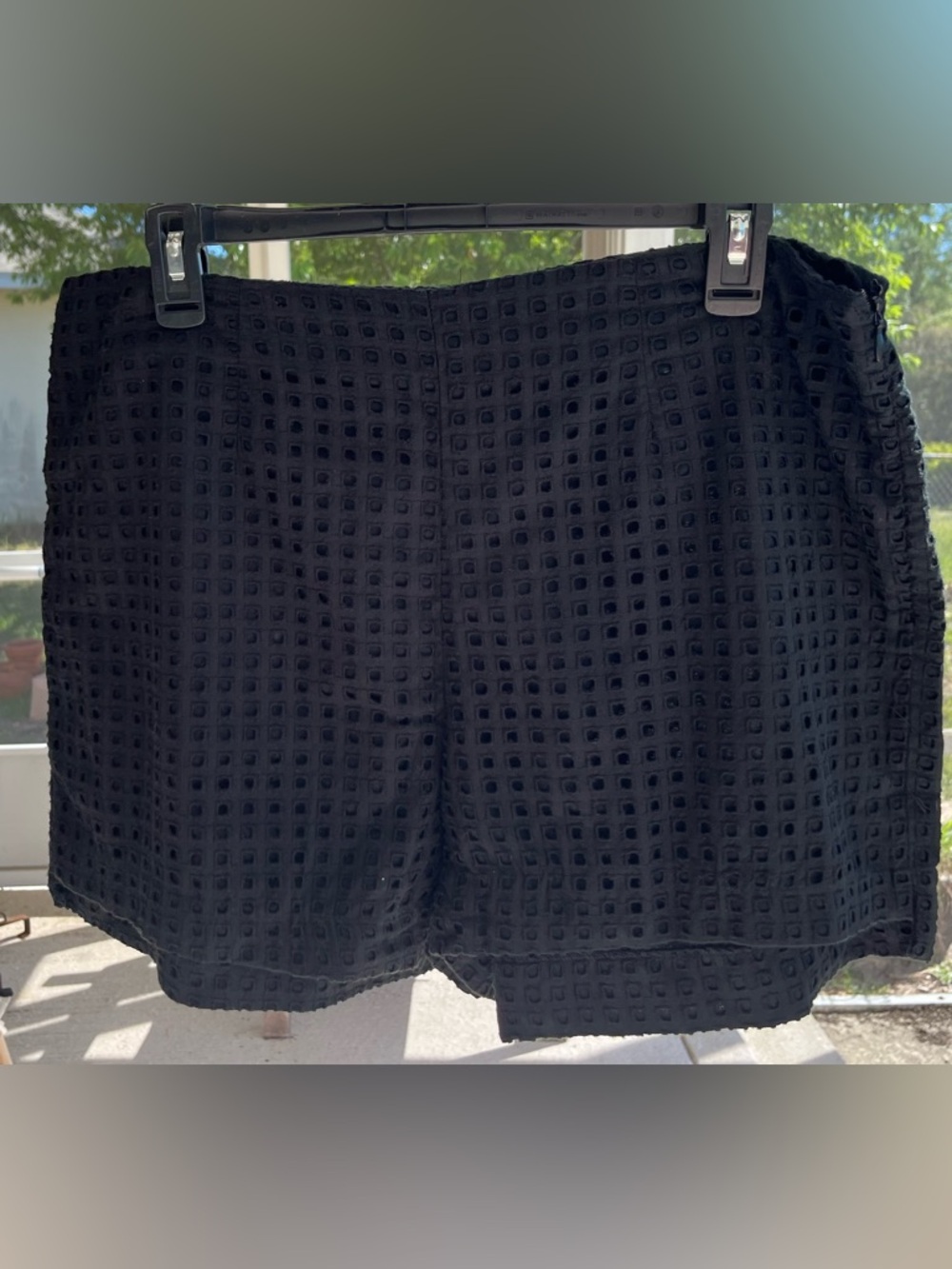 who what wear black square eyelet shorts